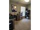 Spare room or office space featuring desk, storage, and bright natural light from window at 2509 Montecito Ave, Eustis, FL 32726