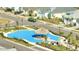 Community picnic spot featuring shaded area and colorful landscaping at 198 Gypsy Palace Ln, Daytona Beach, FL 32124