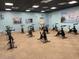Brightly lit exercise room with multiple stationary bikes and modern decor at 198 Gypsy Palace Ln, Daytona Beach, FL 32124