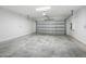 Spacious two car garage with overhead door and concrete floors at 198 Gypsy Palace Ln, Daytona Beach, FL 32124