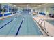Inviting indoor swimming pool with lane markers and plenty of natural light at 198 Gypsy Palace Ln, Daytona Beach, FL 32124