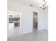 Bright living area with open access to the kitchen and bathroom, featuring contemporary finishes at 198 Gypsy Palace Ln, Daytona Beach, FL 32124