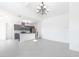 Spacious living area seamlessly integrating the kitchen, offering modern design and ample natural light at 198 Gypsy Palace Ln, Daytona Beach, FL 32124