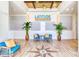 Bright lobby featuring stylish seating, decor, and a compass starburst design on the floor at 198 Gypsy Palace Ln, Daytona Beach, FL 32124