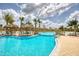 Gorgeous resort-style pool featuring a walking bridge and crystal-clear water at 198 Gypsy Palace Ln, Daytona Beach, FL 32124