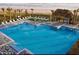 Expansive pool offering plenty of room for swimming with beach access, tiki hut, and beach chairs at 198 Gypsy Palace Ln, Daytona Beach, FL 32124