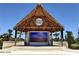 Town Square Stage features a large screen under the shade of a tiki hut at 198 Gypsy Palace Ln, Daytona Beach, FL 32124
