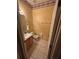 Powder room with tile flooring, vanity, and decorative American flag wallpaper border at 606 Carrigan Woods Trl, Oviedo, FL 32765
