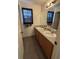 Bathroom features double sinks, mirror and vanity, providing ample space at 606 Carrigan Woods Trl, Oviedo, FL 32765