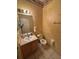 Half-bathroom with a sink, toilet, and neutral color scheme at 606 Carrigan Woods Trl, Oviedo, FL 32765