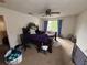 Bedroom featuring natural light, ceiling fan, and carpet flooring at 606 Carrigan Woods Trl, Oviedo, FL 32765