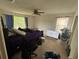 Bedroom featuring natural light, ceiling fan, and carpet flooring at 606 Carrigan Woods Trl, Oviedo, FL 32765