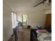 Bedroom featuring natural light, ceiling fan, and carpet flooring at 606 Carrigan Woods Trl, Oviedo, FL 32765