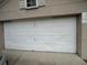 Close-up of a two-car garage door at 606 Carrigan Woods Trl, Oviedo, FL 32765