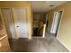 Hallway with carpet floors connecting various rooms on the upper level at 606 Carrigan Woods Trl, Oviedo, FL 32765