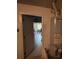 View of water heater and doorway leading to a bright dining area at 606 Carrigan Woods Trl, Oviedo, FL 32765
