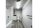 Functional bathroom with a combined shower and tub, modern vanity, and essential fixtures at 10222 Rockridge Rd, Lakeland, FL 33810