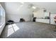 Bright bonus room with vaulted ceilings, kitchenette, and ample space for various activities at 10222 Rockridge Rd, Lakeland, FL 33810