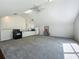 Spacious bonus room featuring a kitchenette and ample open floor space for flexible use at 10222 Rockridge Rd, Lakeland, FL 33810