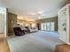 Spacious living room with carpet, open layout, and natural light at 10222 Rockridge Rd, Lakeland, FL 33810