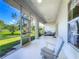 Spacious screened porch with a view of the beautiful green lawn at 10222 Rockridge Rd, Lakeland, FL 33810