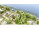 Aerial view of a waterfront neighborhood with docks on a lake at 1149 Shady Cove E Rd, Haines City, FL 33844