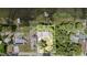 Aerial view of the property showcasing the layout, large lot size, proximity to the lake, and potential for outdoor enjoyment at 1149 Shady Cove E Rd, Haines City, FL 33844