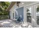 Charming deck with seating off the main room perfect for relaxing and enjoying serene lake views in a quiet atmosphere at 1149 Shady Cove E Rd, Haines City, FL 33844