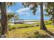 Enjoy waterfront living with a private dock, perfect for boating, fishing, and soaking in the breathtaking lake views at 1149 Shady Cove E Rd, Haines City, FL 33844