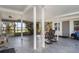 Covered screened-in patio offering scenic lake views and space for relaxing at 1149 Shady Cove E Rd, Haines City, FL 33844
