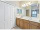 Bathroom featuring double sinks and a large mirror at 2925 Dayton Dr, Winter Haven, FL 33884