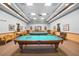 Spacious billiard room featuring multiple pool tables and comfortable seating at 2925 Dayton Dr, Winter Haven, FL 33884