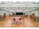 Expansive event space featuring wood floors and abundant seating at 2925 Dayton Dr, Winter Haven, FL 33884