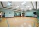 Well-lit exercise room offers comfortable padded floor, mirrored wall, and plenty of space at 2925 Dayton Dr, Winter Haven, FL 33884