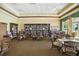 Well-stocked library with ample seating and large windows offering natural light at 2925 Dayton Dr, Winter Haven, FL 33884