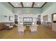 A well-lit lobby with comfortable seating, wooden floors, and high ceilings at 2925 Dayton Dr, Winter Haven, FL 33884