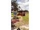 Charming red gazebo with scenic views of the community at 4733 Club Cir, Lakeshore, FL 33854