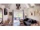 Cozy living room with ample seating, natural light, and a stylish decor at 4733 Club Cir, Lakeshore, FL 33854