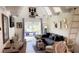 Cozy living room with ample seating, natural light, and a stylish decor at 4733 Club Cir, Lakeshore, FL 33854