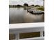 Scenic waterfront view showcasing a peaceful lake with boats docked, providing a serene atmosphere at 4733 Club Cir, Lakeshore, FL 33854