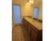 Bathroom features double sinks, granite countertops and under-cabinet storage at 8923 Cuban Palm Rd, Kissimmee, FL 34747