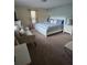 Bright bedroom with plush carpeting, great window light, and coordinated decor at 8923 Cuban Palm Rd, Kissimmee, FL 34747