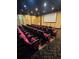 A spacious cinema has red seating and a large screen for entertainment at 8923 Cuban Palm Rd, Kissimmee, FL 34747