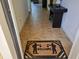 Welcoming foyer with tiled flooring and a decorative 'Welcome' mat at 8923 Cuban Palm Rd, Kissimmee, FL 34747