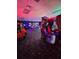 Brightly lit game room featuring various arcade games and a pool table at 8923 Cuban Palm Rd, Kissimmee, FL 34747