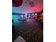 Brightly lit game room featuring various arcade games and a pool table at 8923 Cuban Palm Rd, Kissimmee, FL 34747