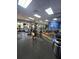 The well-equipped gym features modern exercise machines and mirrored walls at 8923 Cuban Palm Rd, Kissimmee, FL 34747