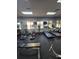 This gym features modern treadmills and elliptical machines with large windows at 8923 Cuban Palm Rd, Kissimmee, FL 34747