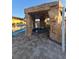 Hot tub and waterfall feature next to community pool at 8923 Cuban Palm Rd, Kissimmee, FL 34747