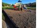 A community playground offers safe, engaging fun with a slide, steps and a variety of climbing features at 8923 Cuban Palm Rd, Kissimmee, FL 34747